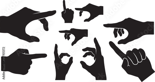 Collection of pointing hand silhouettes in various gestures