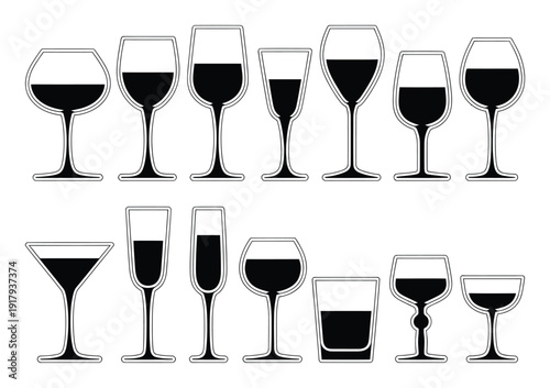 Collection of Various Wine and Cocktail Glasses Filled with Dark Liquid