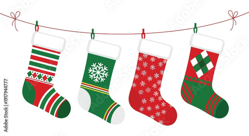 Four festive Christmas stockings hang on a red string. They include striped, snowflake, snowflakes on red, and argyle designs in red, green, and white.