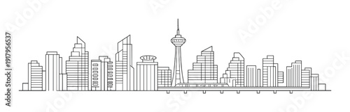 City skyline with observation tower and elevated train on platform