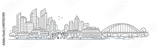 Urban skyline with arched bridge and waterfront development