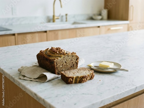 Banana Bread Loaf with Walnuts on White Marble Kitchen Island
