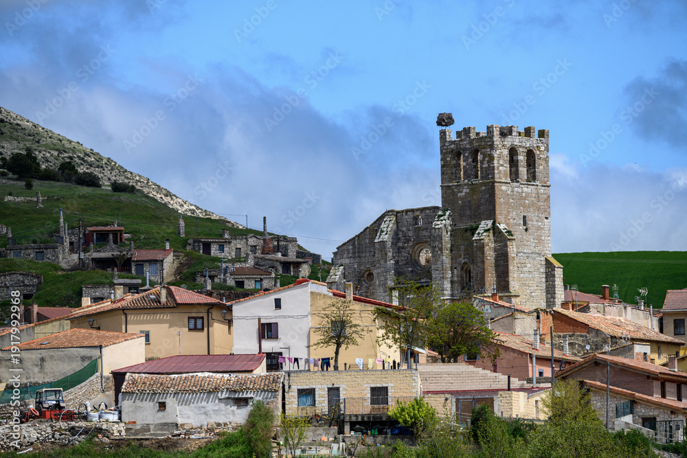 Naklejka premium Church of Santa Eulalia in Palenzuela, Palencia viewed from surrounding village