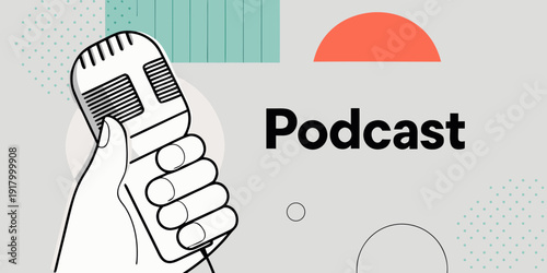 A hand holding a vintage microphone with the word podcast displayed