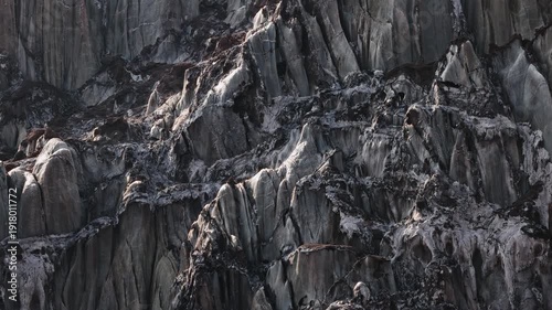 Colorful salt mountains on Hormuz Island in Iran, known as the Rainbow Island, featuring surreal mineral Martian landscape and vivid natural patterns in Persian Gulf. Unique geological formations and 