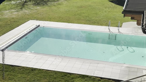 steaming outdoor swimming pool at hotel spa