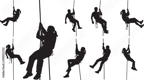 Silhouettes of people rappelling down ropes in various poses