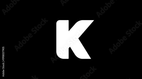 White uppercase letter K on a black background, a simple graphic representation of the alphabet character for design resources