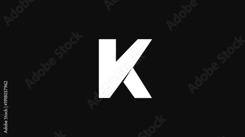 Modern geometric white letter K monogram on a solid black background, minimalist alphabet initial design, graphic element
