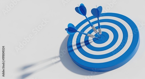 Blue and white target with three darts hitting the bullseye accurately