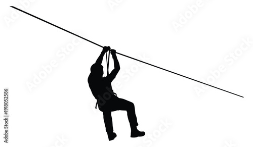 Man ziplining through adventure landscape silhouette