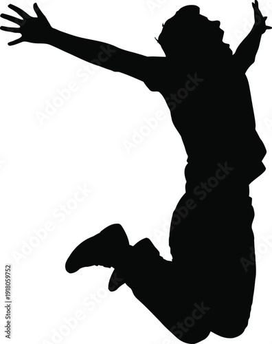 Silhouette of a joyful person jumping in mid-air with arms outstretched