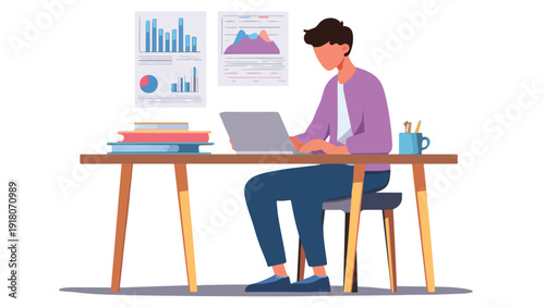 Person working on laptop at desk with books and charts in background