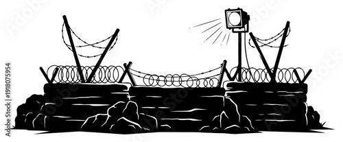 Military defensive border fortification with sandbags and barbed wire fence