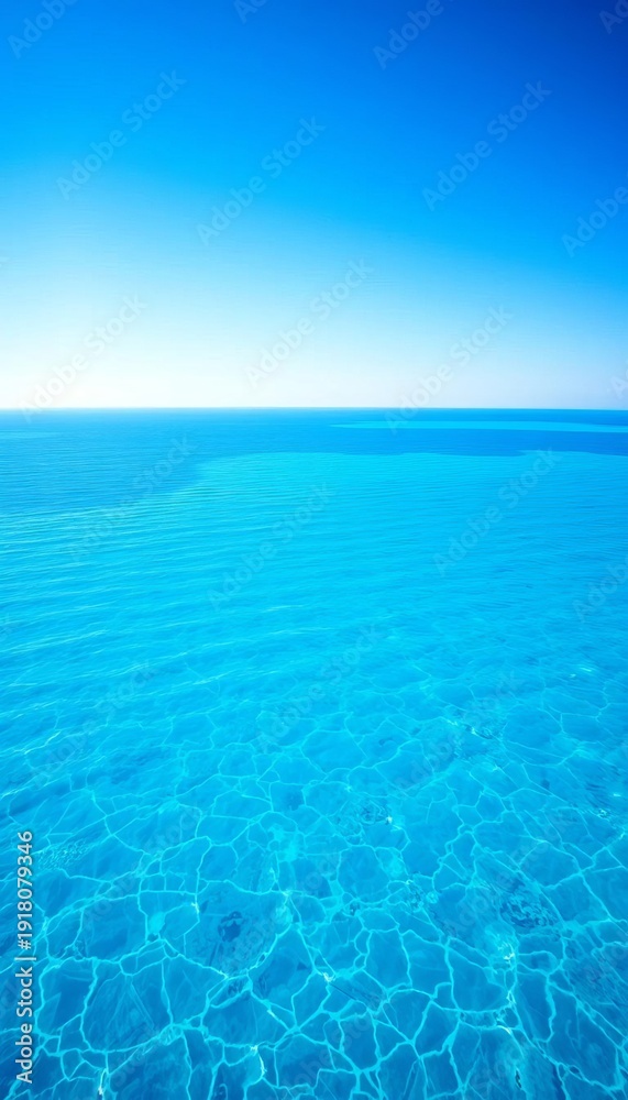 Fototapeta premium Vast, tranquil blue ocean stretching to the horizon under a clear sky, endless, aquatic