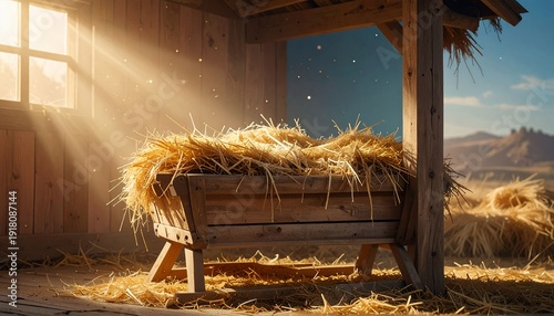 Rustic wooden manger filled with golden hay bathed in warm sunlight, rural scene