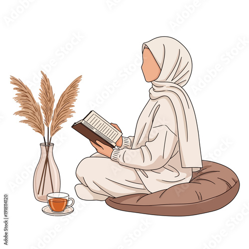Woman in hijab reading Quran with tea and reed decor, serene spiritual moment at home