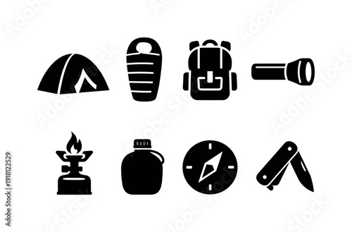 Outdoor camping essentials: tent, sleeping bag, backpack, flashlight, camp stove, canteen, compass, pocket knife