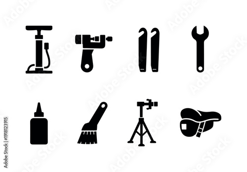 Outdoor bicycle maintenance tools: bike pump, chain tool, tire lever, wrench, lubricant bottle, cleaning brush, repair stand, saddle bag