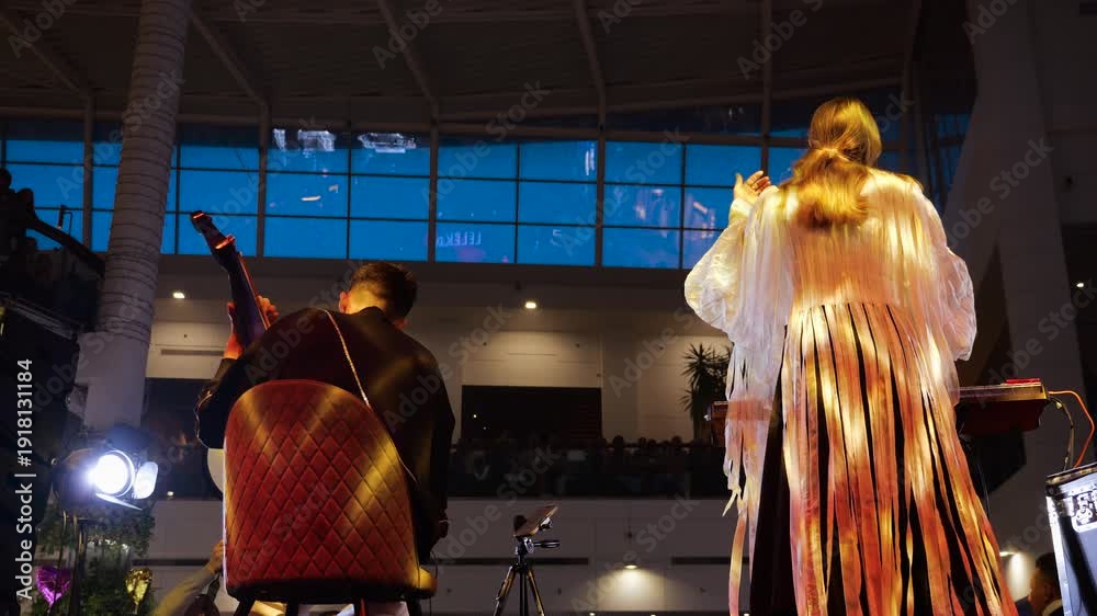 Folk Singer Performance Ukrainian folk music performance in a modern shopping mall atrium ...