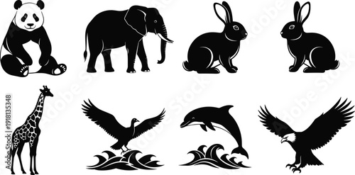 Black vector silhouette set of diverse wild animals including a panda elephant rabbits giraffe dolphin and flying eagles for wildlife and nature conservation branding
