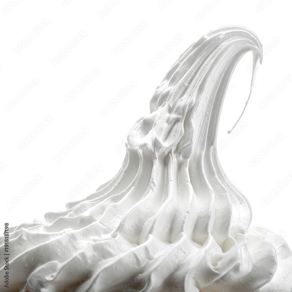 Obraz premium Close-up of a swirl of white whipped cream or soft serve ice cream against a clean white background.