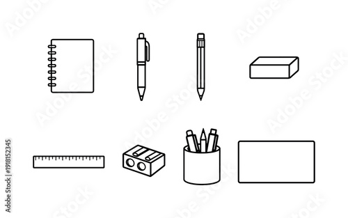 Office desk writing essentials: notebook, ballpoint pen, mechanical pencil, eraser, ruler, pencil sharpener, pen holder, desk blotter