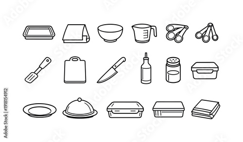 Home roasted squash cooking tools: baking tray, parchment paper, mixing bowl, measuring cup, measuring spoon, spatula, cutting board, chef knife, oil