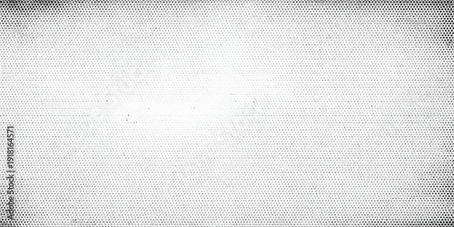 A blank vintage grey grunge paper texture with a rough white canvas pattern and old linen fabric material creates an empty light textured surface backdrop for design