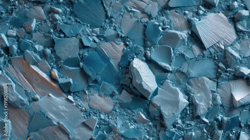 Crushed light blue eyeshadow makeup forming an abstract textured background