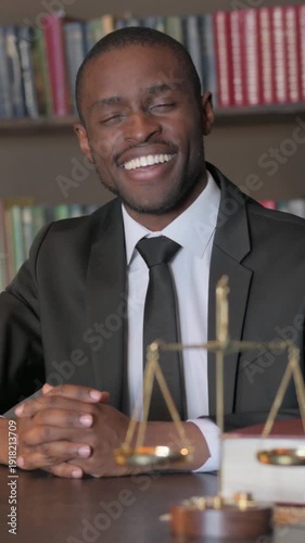 Wallpaper Mural African American Lawyer Shaking Head in Acceptance in Office, Vertical Video Torontodigital.ca