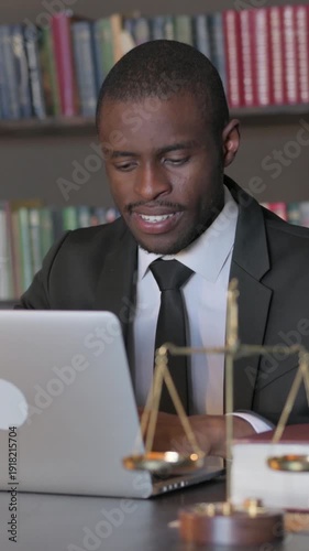 Wallpaper Mural African American Lawyer Working on Laptop, Vertical Video Torontodigital.ca