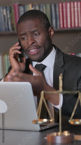 Wallpaper Mural African American Lawyer Talking on Phone with Client, Vertical Video Torontodigital.ca
