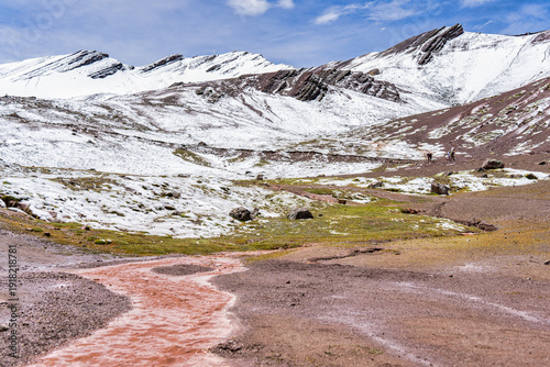 Wallpaper Mural Scenic view of snow-covered peaks and rugged mountain terrain in the Peruvian Andes, captured from the hiking path to Rainbow Mountain. Torontodigital.ca