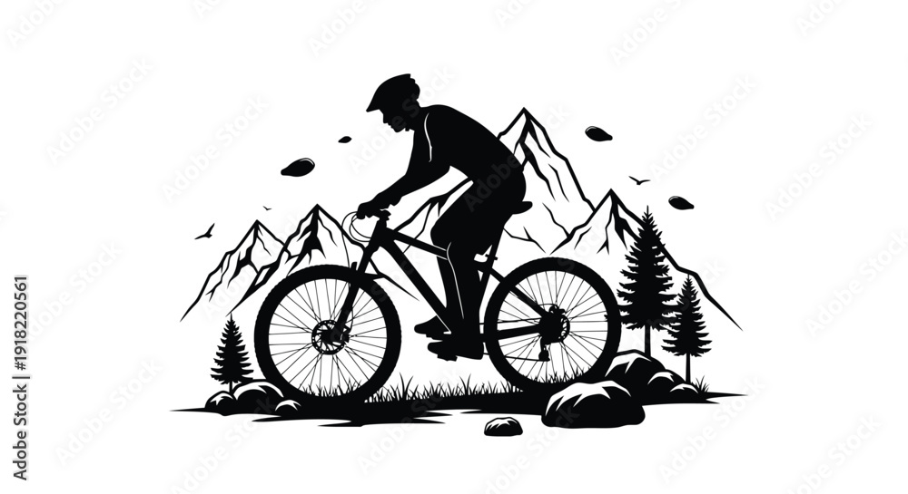 Obraz premium Silhouette of a mountain biker riding through a rugged landscape