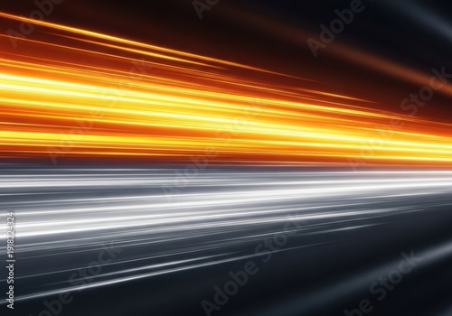 A blurry image of a road with orange and white lights
