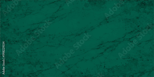 An abstract green grunge background with a dark textured surface features an aged vintage design on a rough paint-splattered wall of old dirty paper or canvas