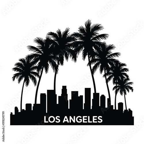 Silhouette of palm trees and los angeles cityscape at sunset