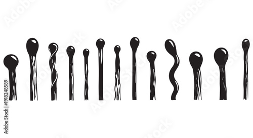 A row of black kitchen whisks with varying twisted wire handles and shiny metal balls on Transparent Background, cooking utensils, isolated, studio shot.