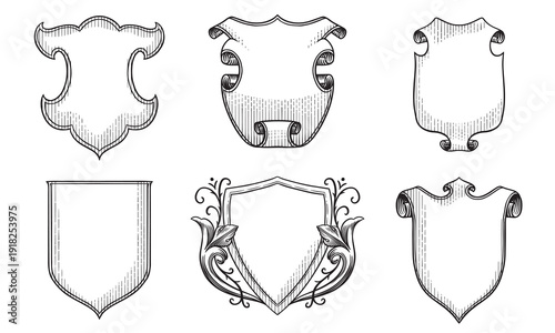 Heraldic shields for coat of arms design. Hand drawn engraving in old traditional medieval style with scrolls and ribbons, modern made elements for family symbols and templates