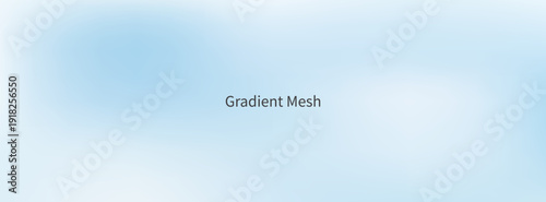 Group of Six Young Diverse Athletes in Navy and Grey Uniforms Posing for a Team Photo on a Green Grass Field with Large Mountains in the Background.