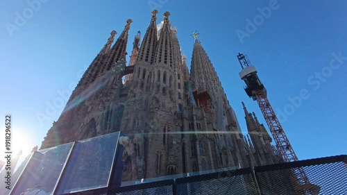  View of the Sagrada Familia's towers under construction against a clear blue sky at Barcelona 