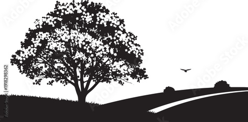 Silhouette of a large tree on a rolling hill landscape with a winding path and a bird flying, symbolizing freedom and nature.