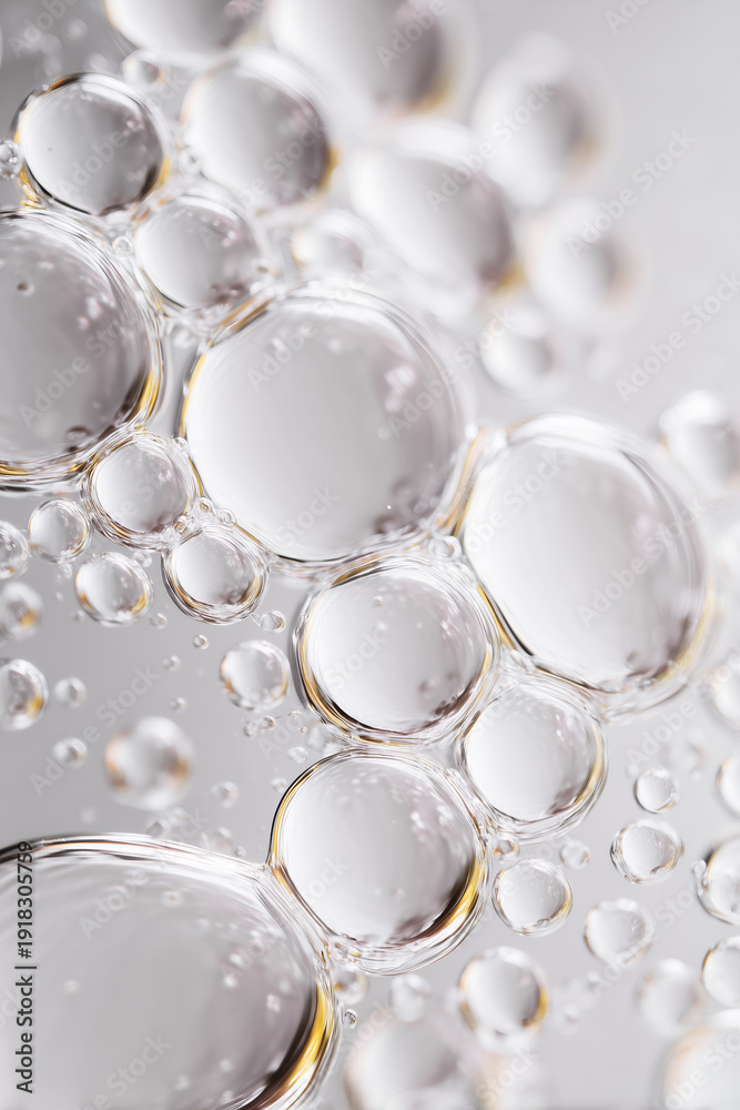 Fototapeta premium Transparent foam bubbles close up macro detail against bathroom background. Cleanliness and hygiene concept.