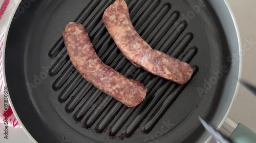 Cooking Delicious Pork Sausages in a Grill Pan