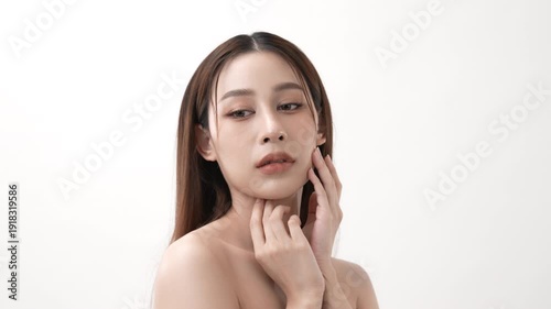 Wallpaper Mural Beauty concept of 4k Resolution. Asian woman touching her face gently on white background. Torontodigital.ca