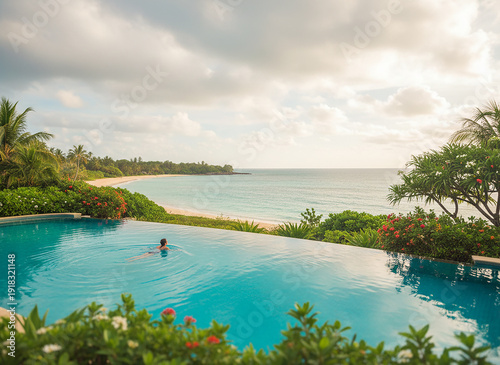 Serene Infinity Pool Overlooking Tropical Beach and Ocean Horizon