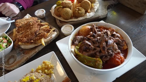 Traditional Arabic Food Table with Various Middle Eastern Dishes