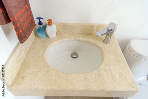 Tableau sur toile Bathroom vanity with oval sink and marble countertop