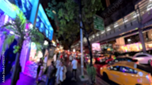 Wallpaper Mural BANGKOK, THAILAND - NOV 2025 : Walking view of Sukhumvit street filled with neon lights of the nightlife entertainment district and urban traffic. Torontodigital.ca